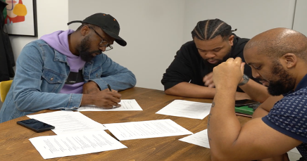 The Eggcellent Farms founders signing incorporation documents, July 2024