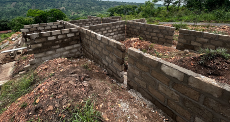 Early block-wall construction on the original Eggcellent Farms site in 2025